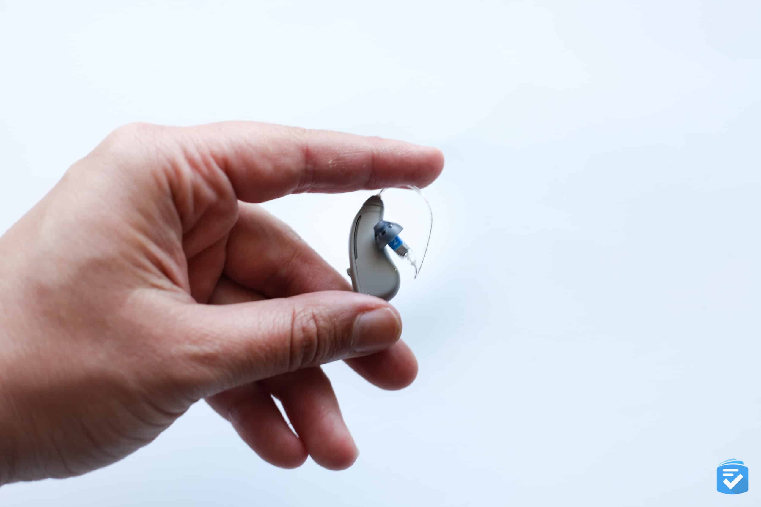 Bose SoundControl Hearing Aids in hand