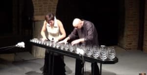 couple playing wine glasses